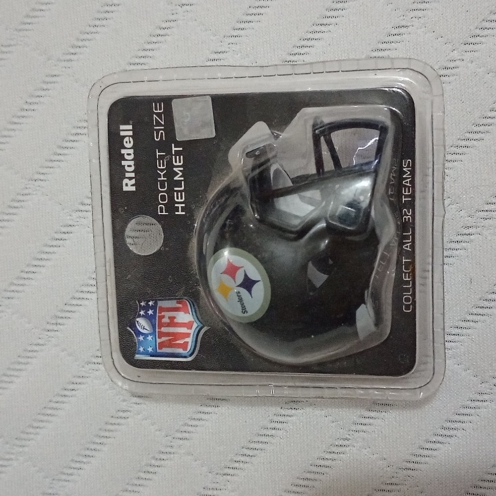 Pocket sized helmet collectors item